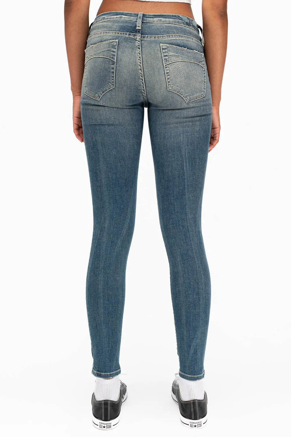 MIDRISE WOMENS SKINNY JEANS IN RIPPED BLUE WASH